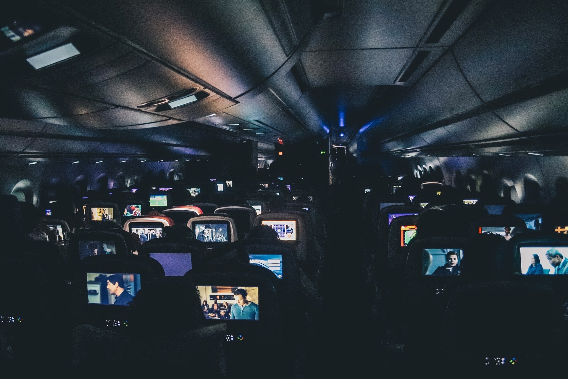 Airplane screens lit up at night