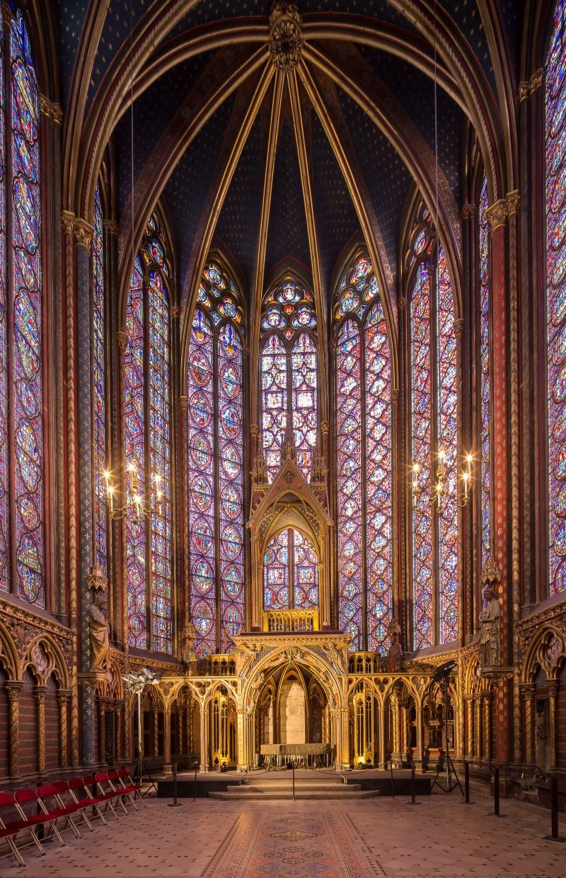 Interior view of Sainte-Chapelle's stained glass windows and nave