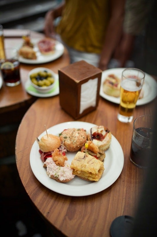 Tapas on a cafe table, food in Valencia isn't always tapas but it's great way to try lots of Valencian cuisine 