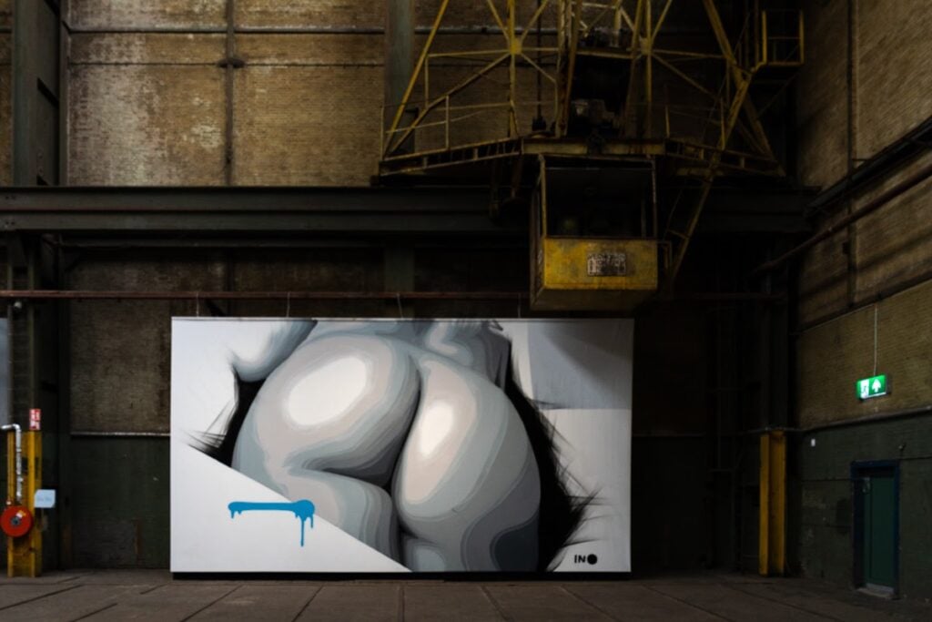 A mural by INO, a street artist whose work is displayed on the walls at STRAAT Museum in Amsterdam.