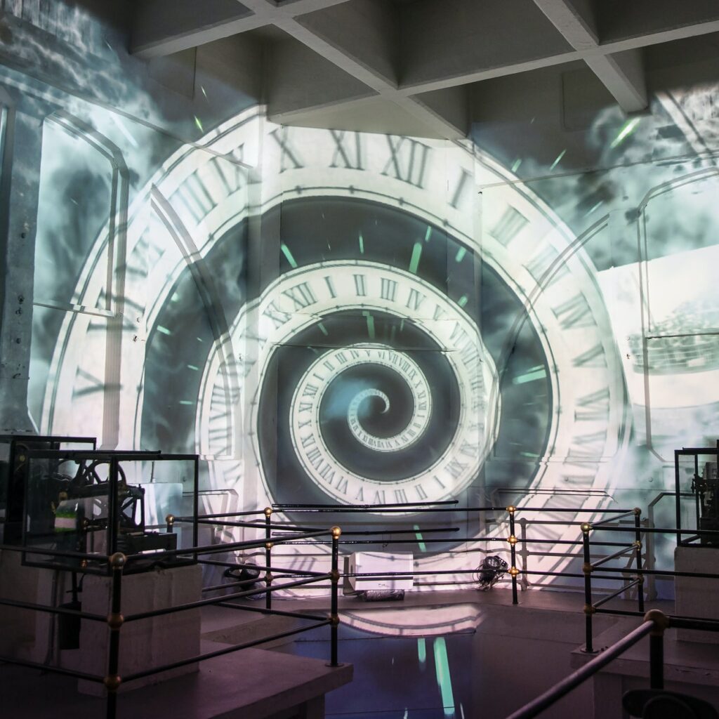 Projection of a hypnotic clock inside the Royal Liver Building