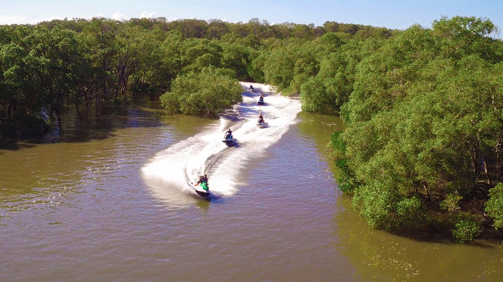 Jet skis through mangroves on Australias Gold Coast 
