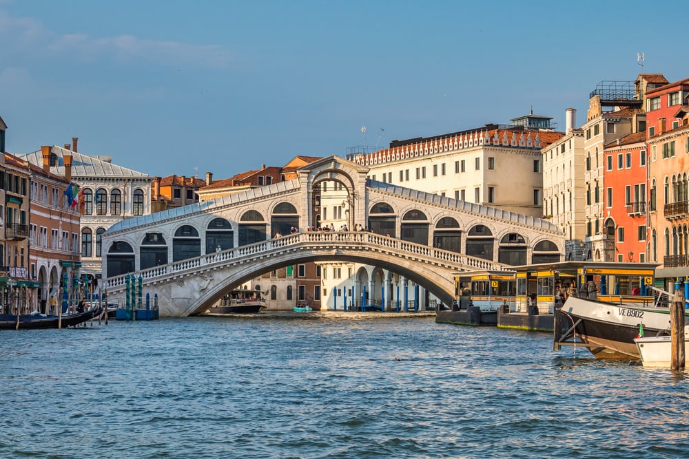 Must-see landmarks Rialto bridge and Grand Canal of Venice.
