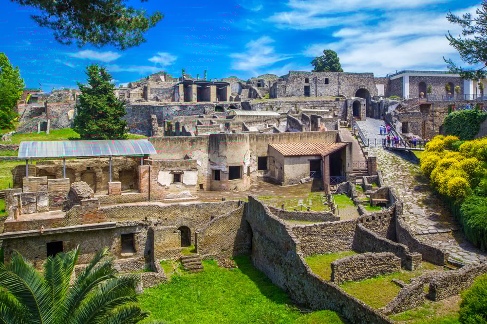 Panoramic view of the ancient city of Pompeii during the day.