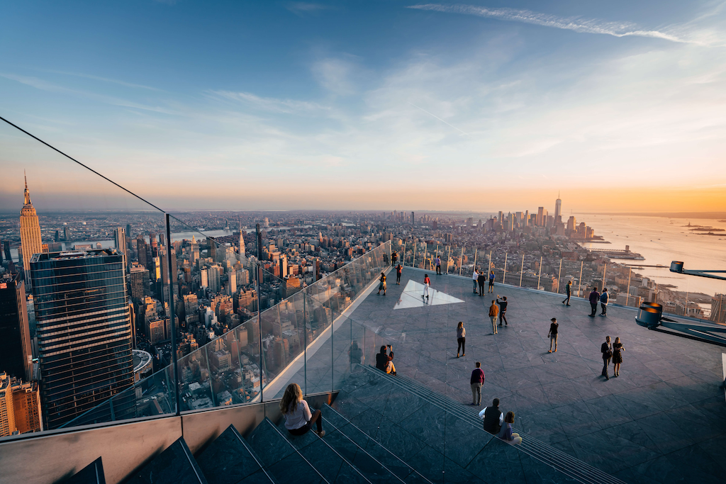 People enjoying the sunset from the Edge platform in Hudson Yards, New York.